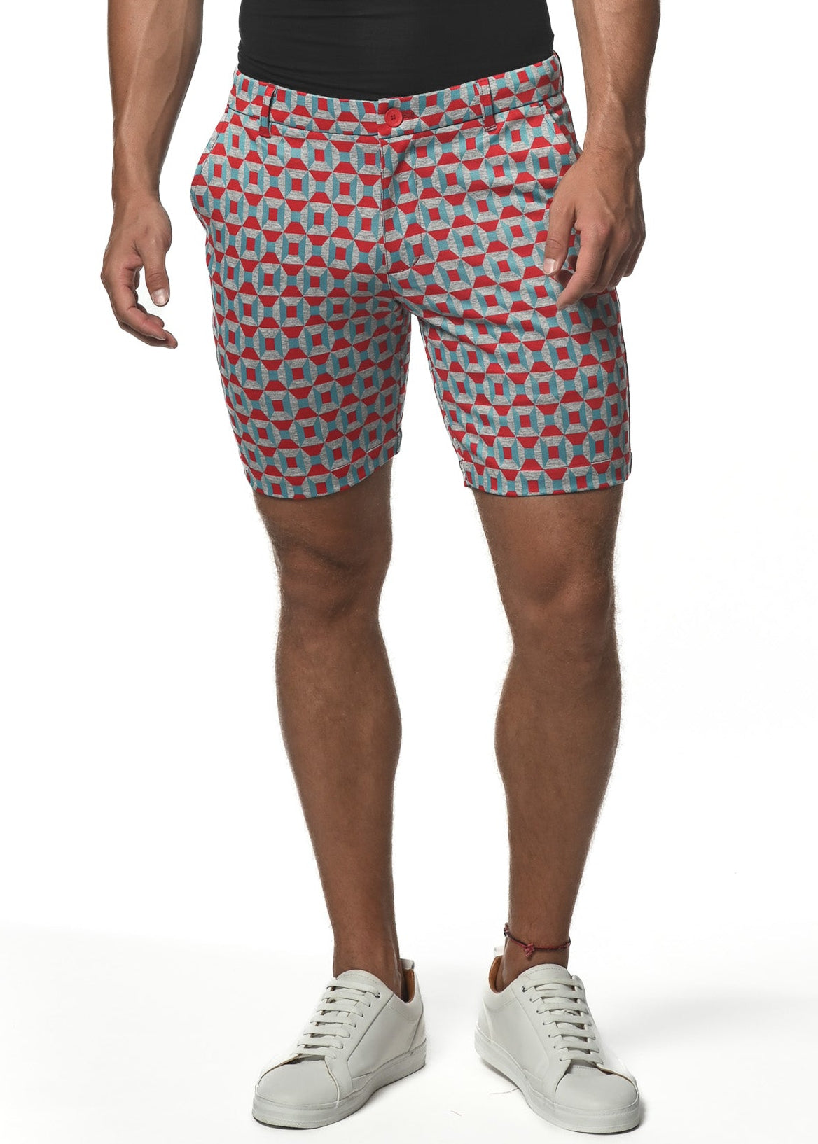 A man wearing a black V-neck t-shirt and red rhombus patterned knit shorts with a stretch waistband, standing against a white background.