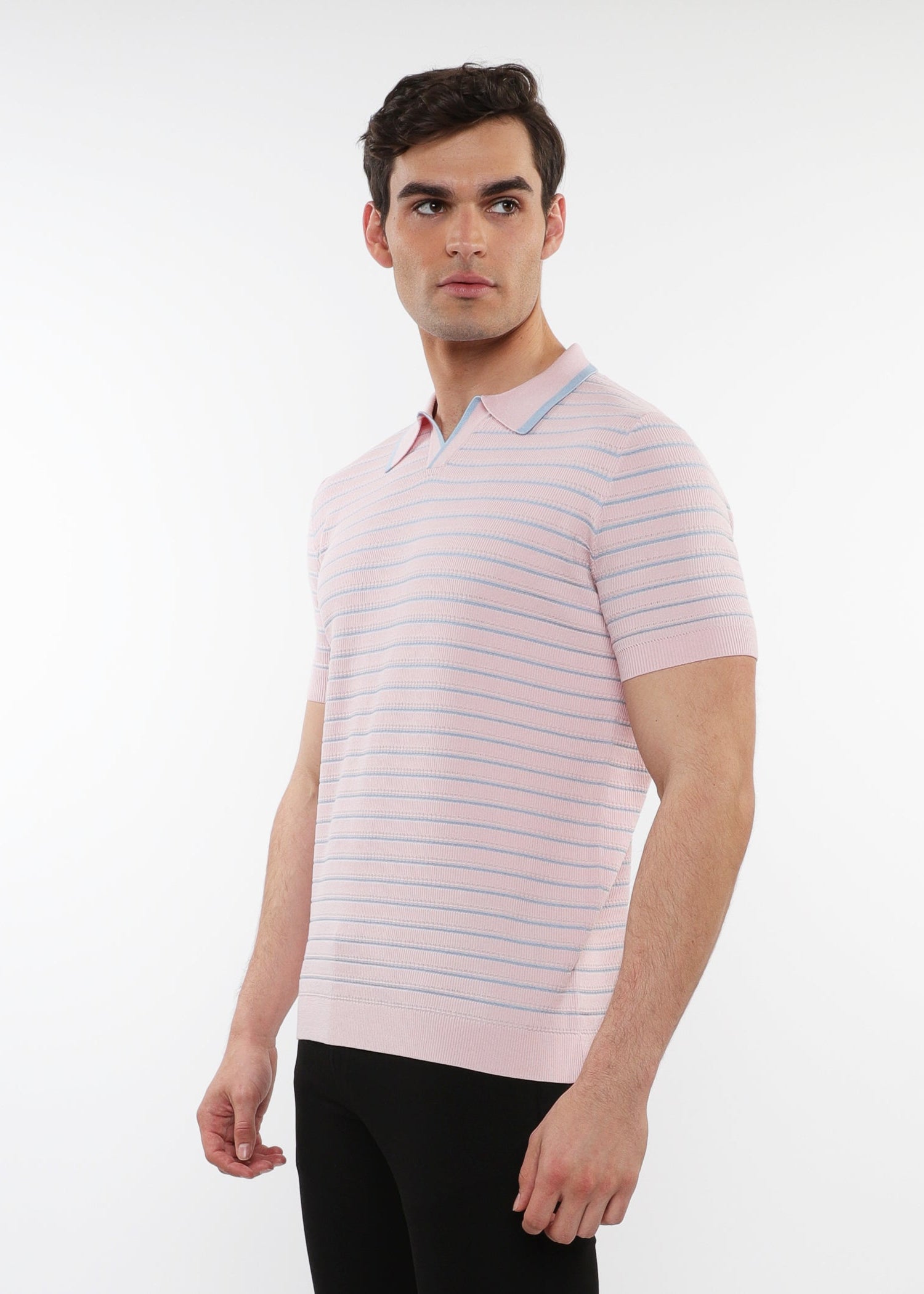 Man wearing a light pink striped polo shirt on a white background
