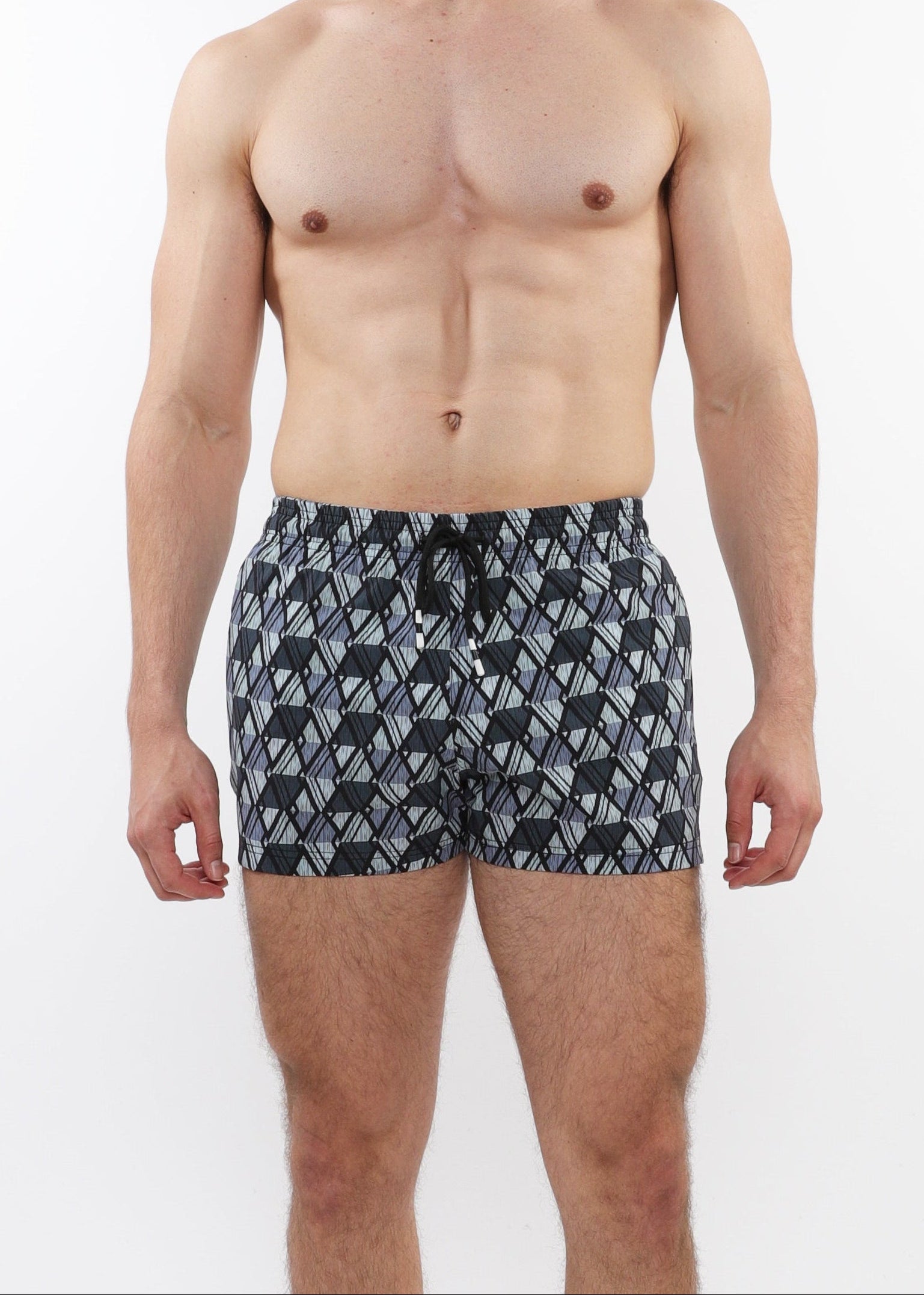 Man wearing patterned underwear on a white background