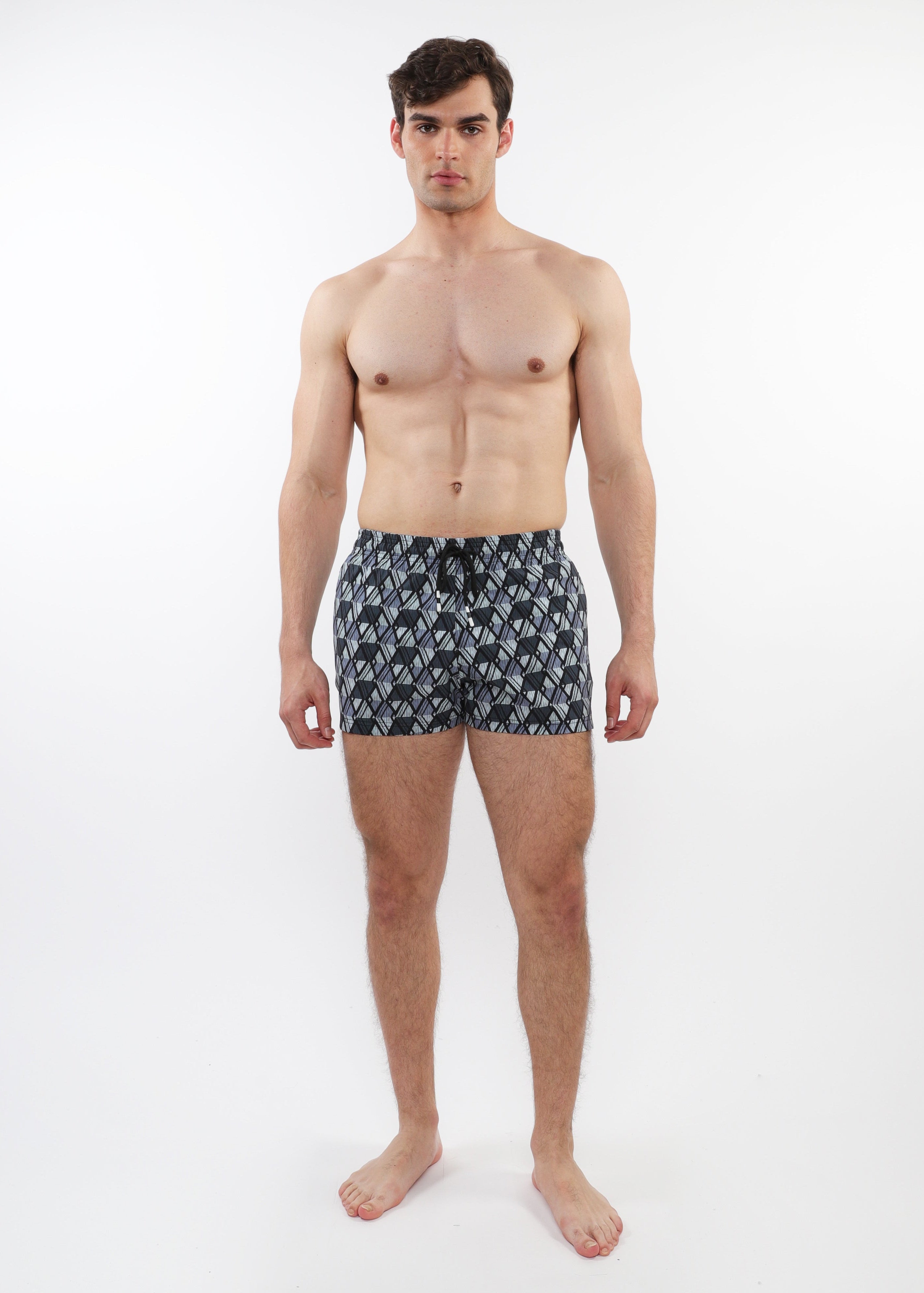 Man wearing patterned underwear on a white background
