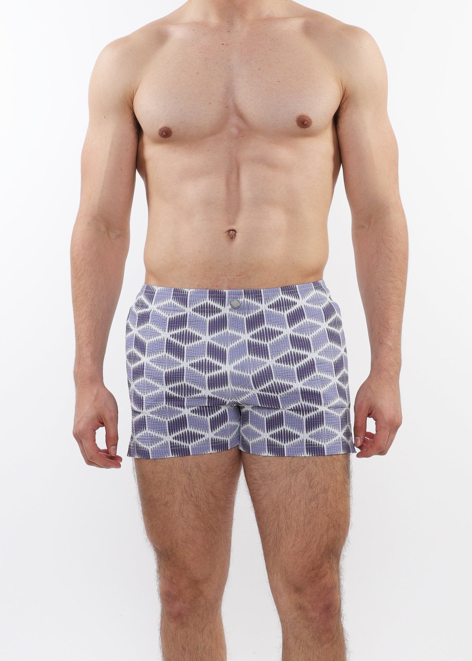 Man wearing patterned underwear on a white background